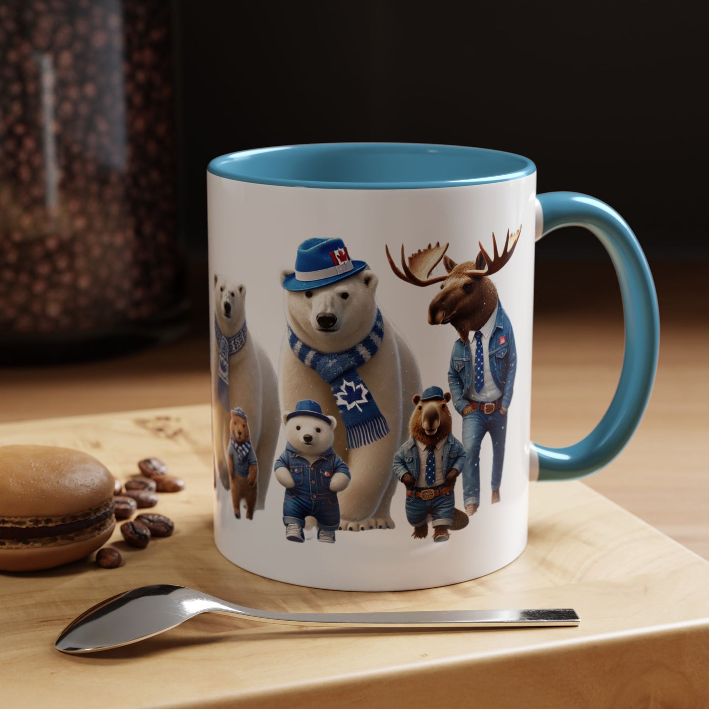 Mug with animal illustrations on a wooden surface with coffee beans and a spoon.