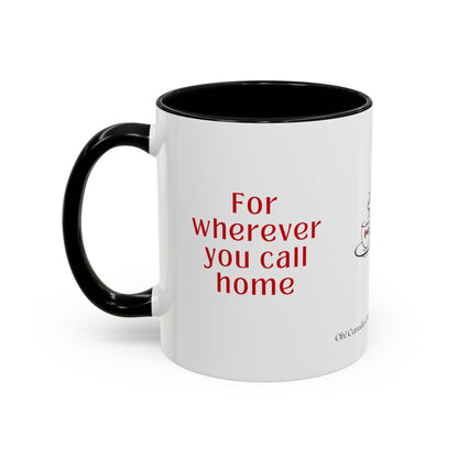 White mug with black handle and interior with red text on a white background