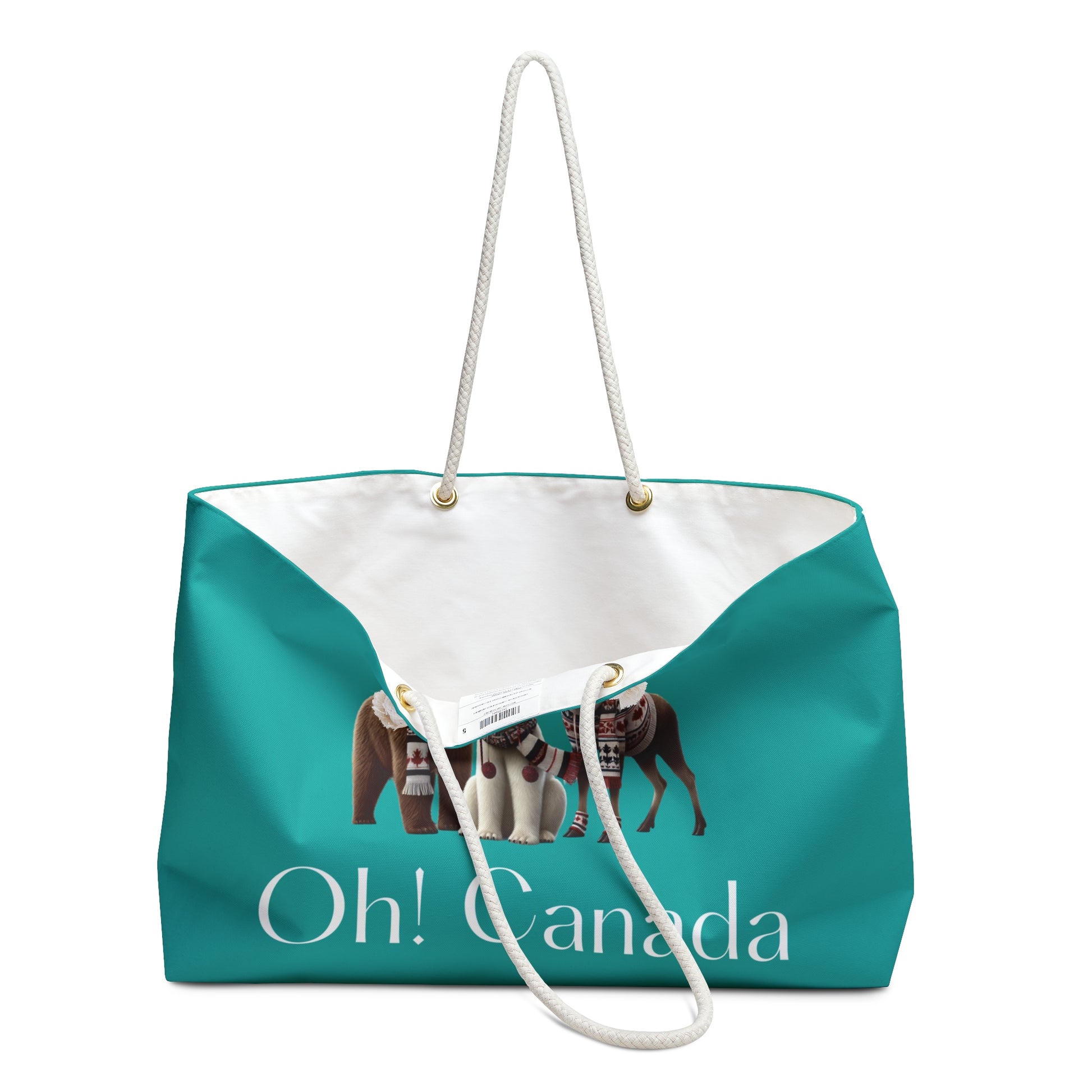 Turquoise inside view of weekender bag with 'Oh! Canada' text and a bear illustration on a white background