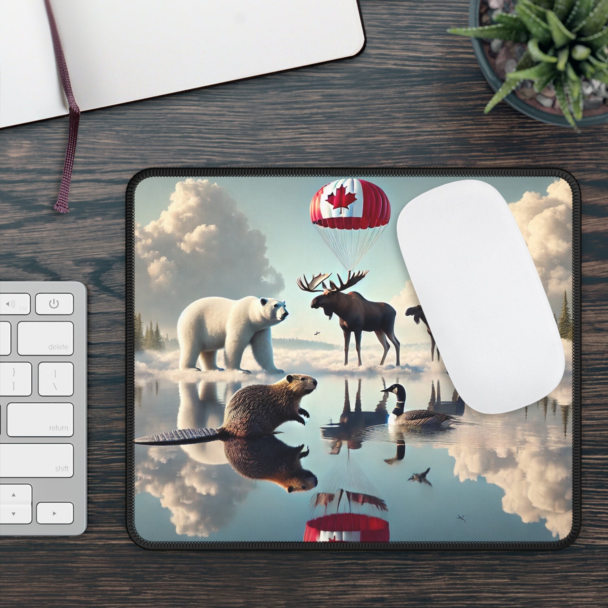 Mouse pad with nature-themed design featuring animals and a Canadian flag, placed on a desk.