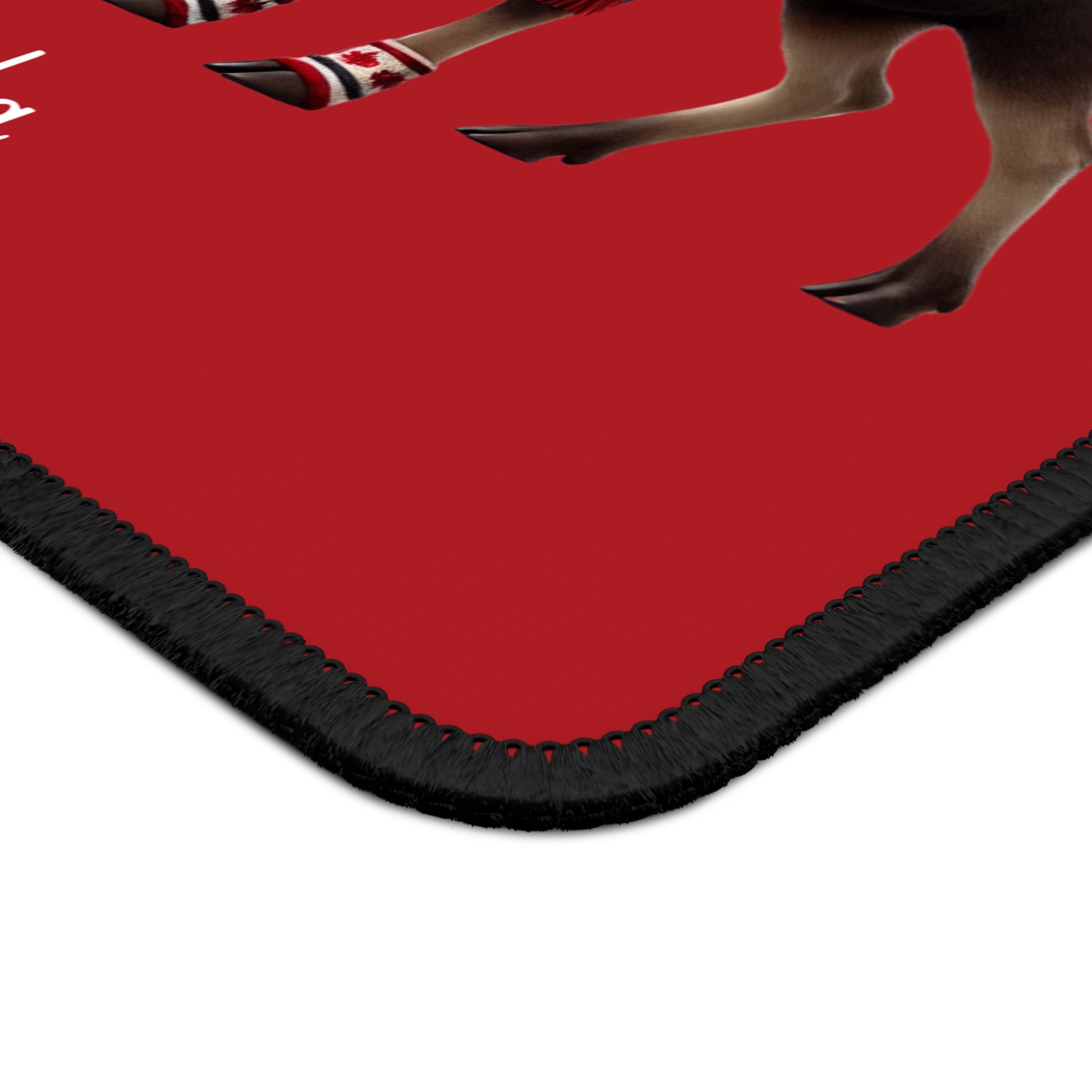 Red mousepad with black border, three wild whimsical animals on a white background