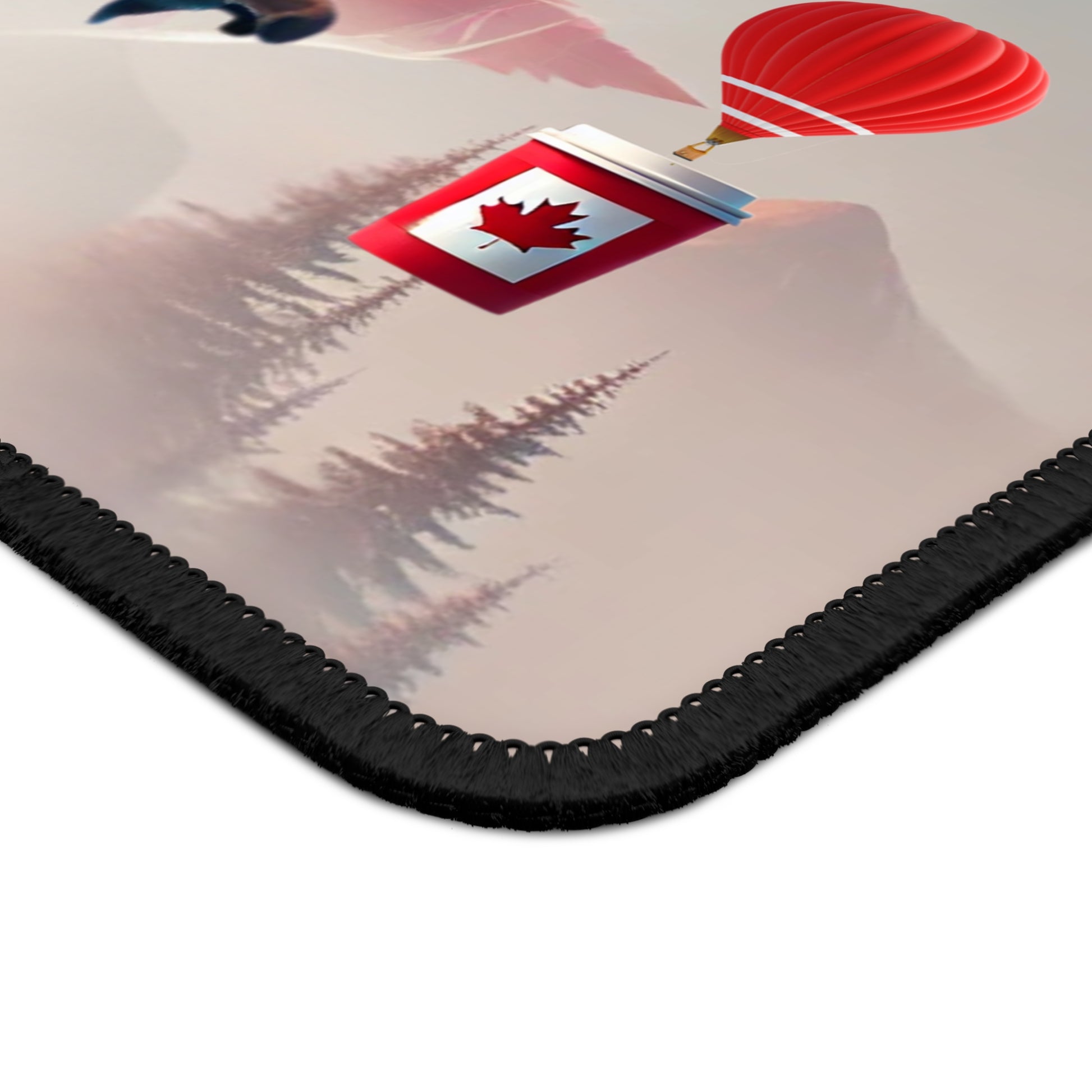 Mousepad with Canadian flag design on a white background