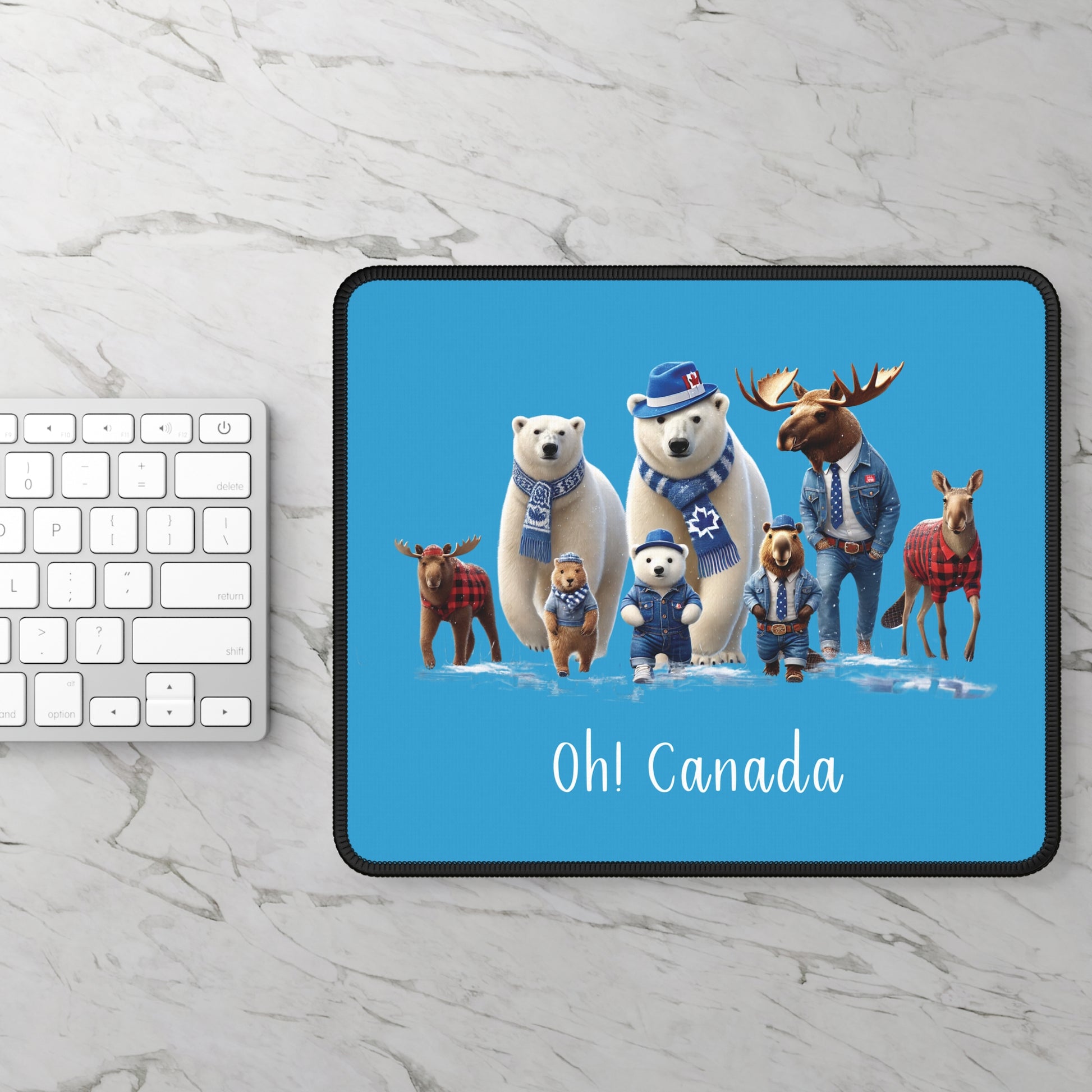 Tablet case with Canadian-themed design featuring bears, moose, and deer on a blue background.
