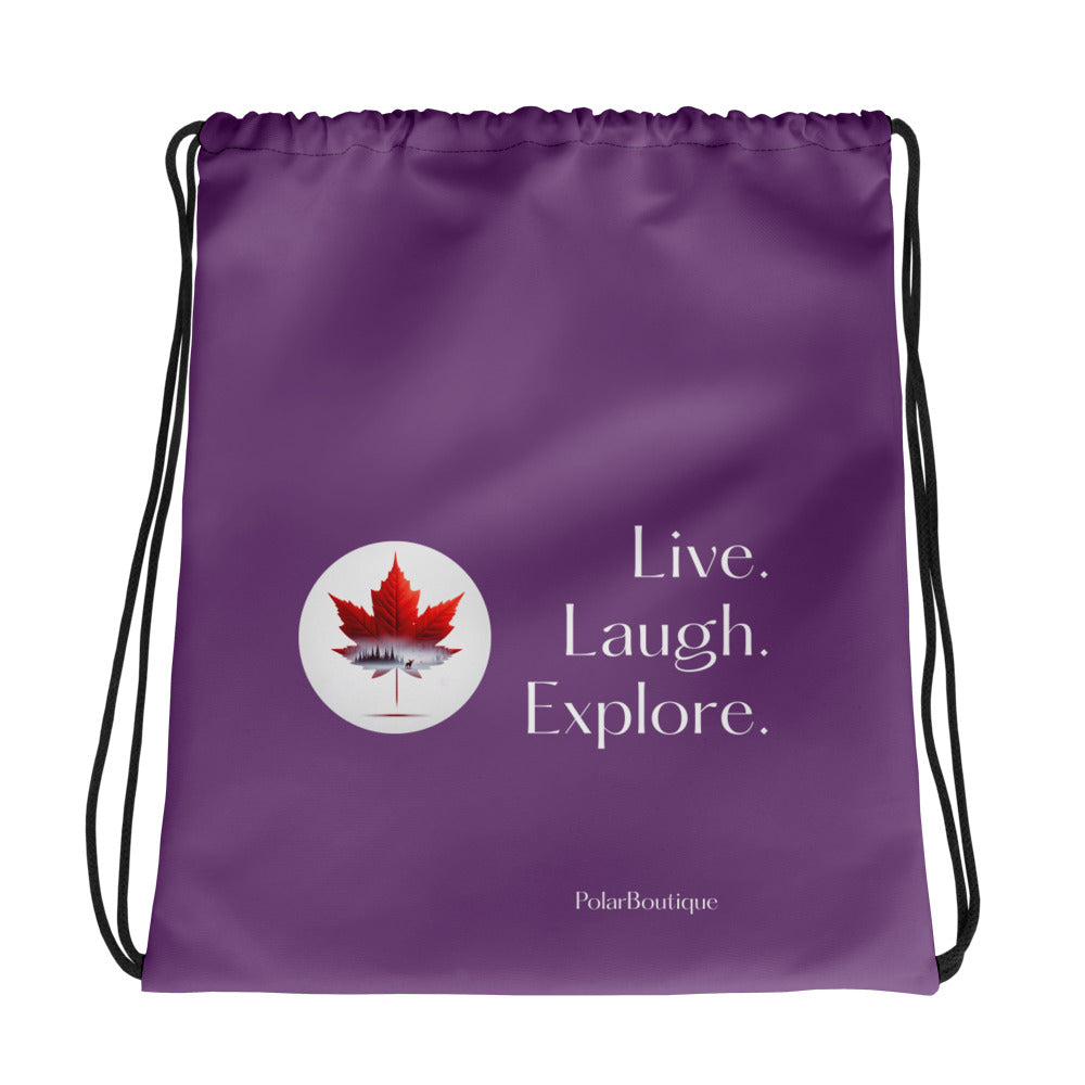 Dark purple drawstring bag with a red maple leaf and text 'Live. Laugh. Explore.' on a white background.