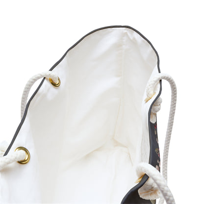 White drawstring bag with gold eyelets looking deep inside