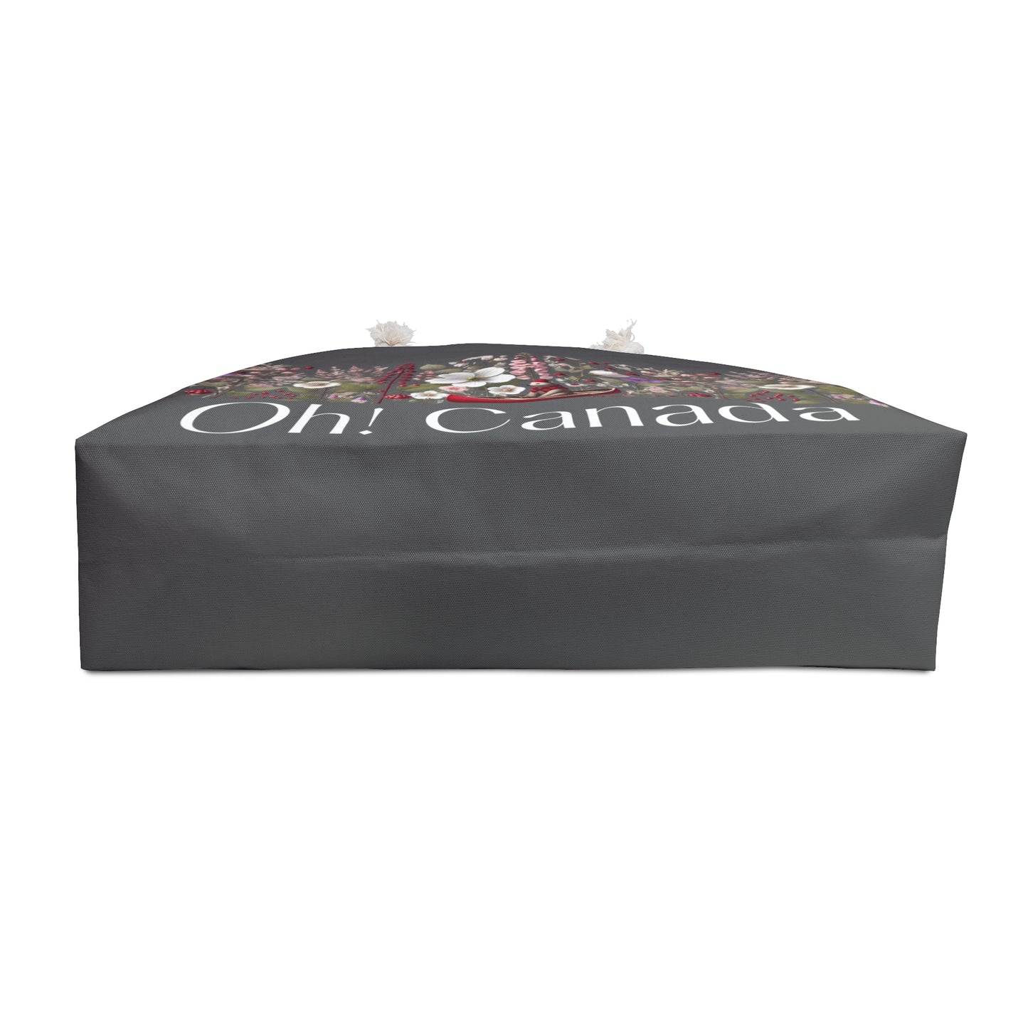 Black rectangular cushion with floral design and 'Oh! Canada' text on a white background