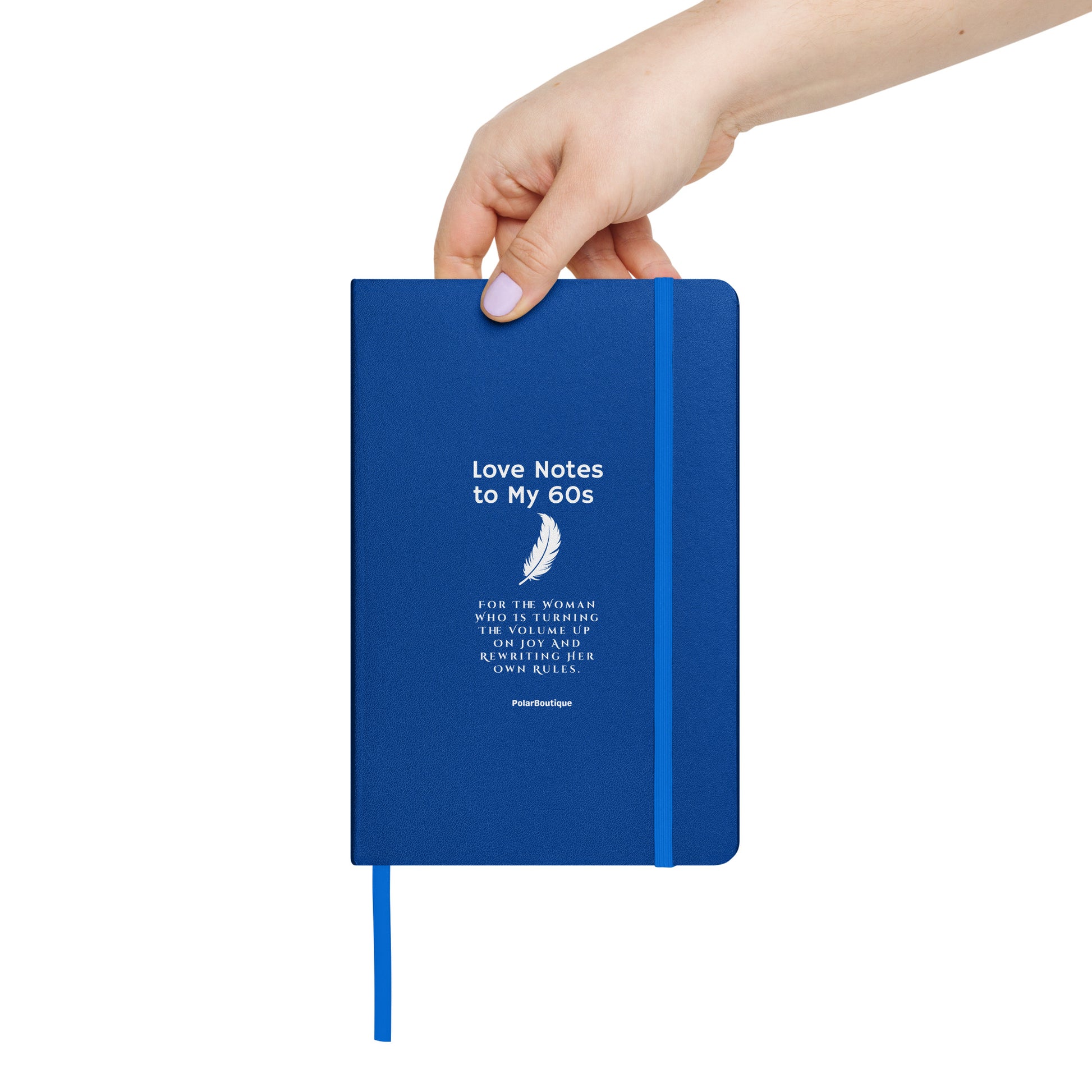 holding journal titled, Love Notes to my 60s royal blue