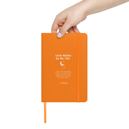 Love Notes to My 70s Journal in Orange being held upright