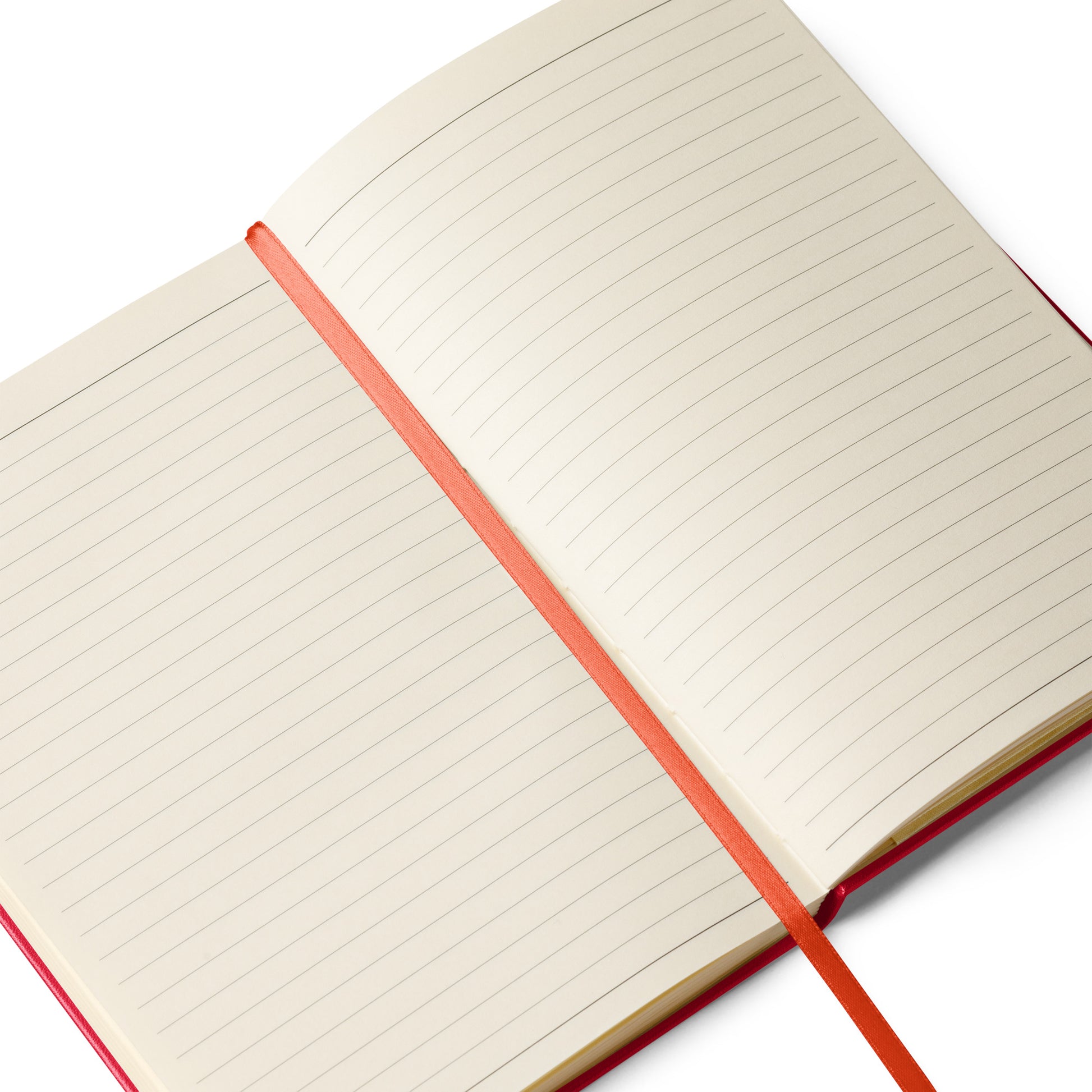 Open notebook with red binding on a white background, red silk bookmark