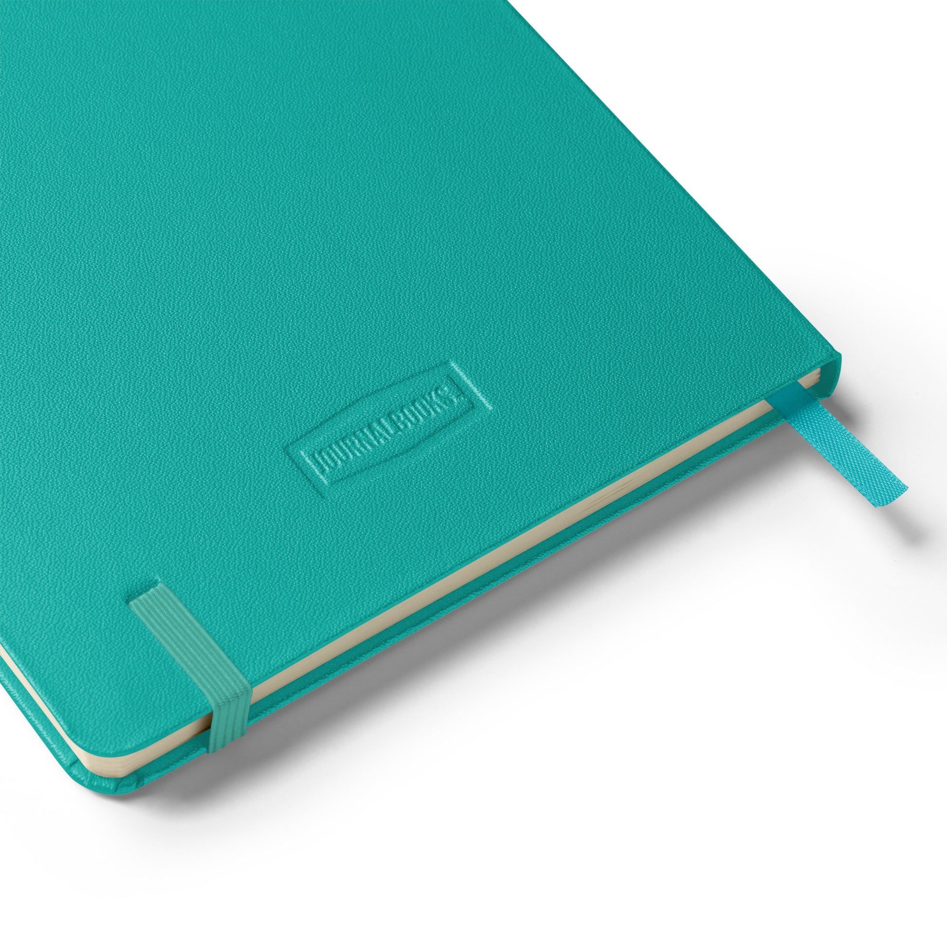 Turquoise-lined notebook with a visible brand logo on a white background