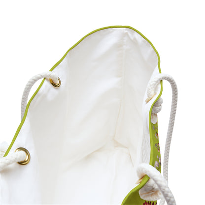 White drawstring bag with green accents on a white background