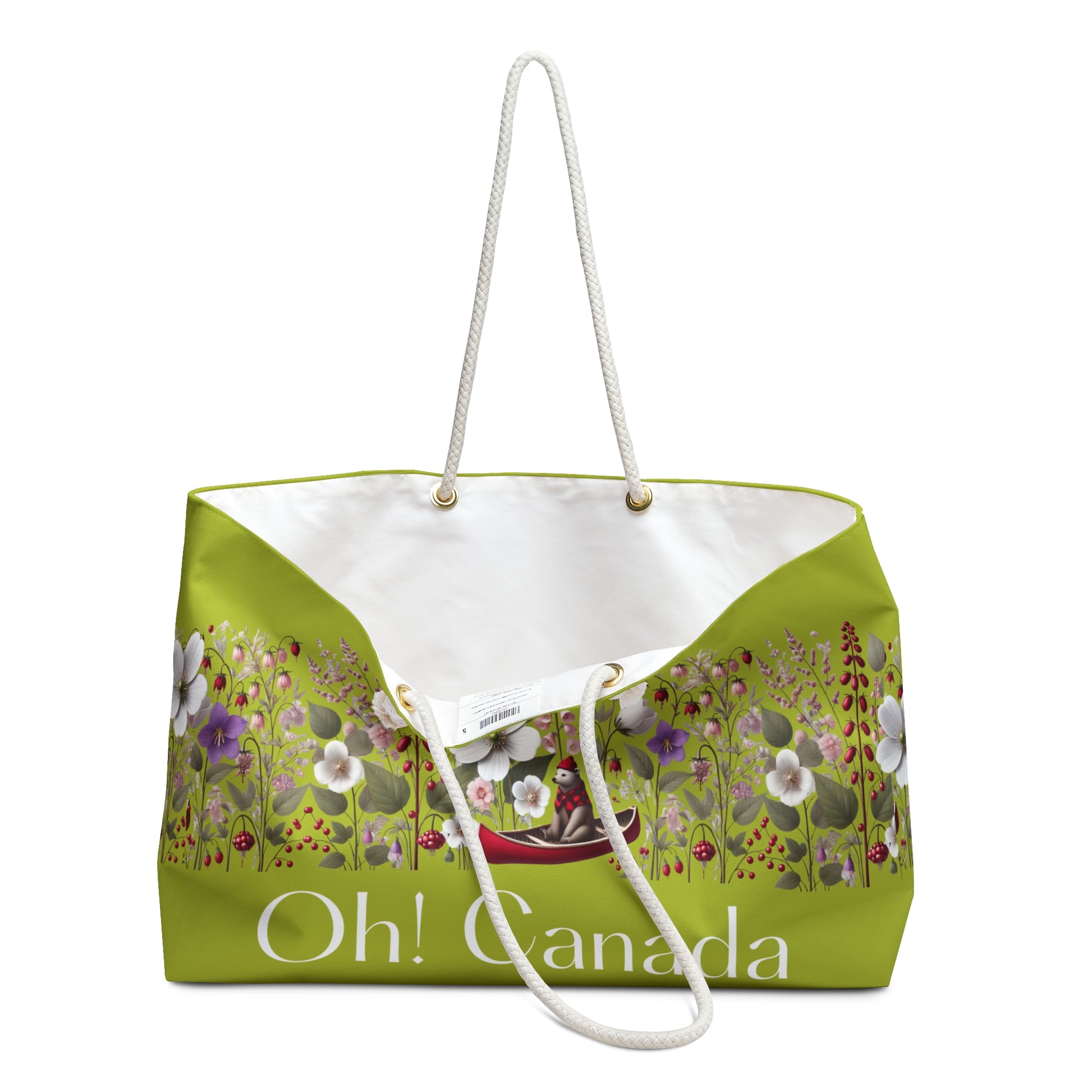 Looking inside the Green tote bag with floral design and 'Oh! Canada' text on a white background