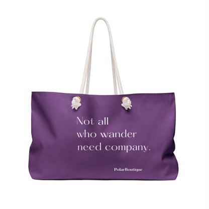 Purple tote bag with white text and handles back side view